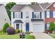 Charming two-story home with blue shutters and a well-manicured lawn and front garden at 622 Bayou Cir, Clover, SC 29710