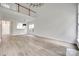 Open concept living room featuring hardwood floors and a view into the dining area at 622 Bayou Cir, Clover, SC 29710