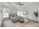 Relaxing main bedroom showcases tray ceiling, neutral décor, and coordinating decor at 622 Bayou Cir, Clover, SC 29710