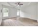 Spacious main bedroom features a trey ceiling, natural light and neutral colors at 622 Bayou Cir, Clover, SC 29710