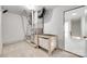 Spacious utility room with furnace, workbench, and access to another room; great for storage and home maintenance at 622 Bayou Cir, Clover, SC 29710