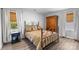 Cozy bedroom featuring hardwood floors, and natural light at 6406 Old Meadow Rd, Charlotte, NC 28227