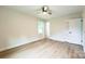 Bedroom featuring natural light, new floors, and a ceiling fan at 6641 Pawnee Dr, Charlotte, NC 28214