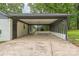 Spacious carport with brick accents, providing ample parking and storage space at 6641 Pawnee Dr, Charlotte, NC 28214