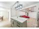 Kitchen island with a view to the living room at 6641 Pawnee Dr, Charlotte, NC 28214
