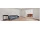 Living room features wood floors, couch and view to dining room at 6641 Pawnee Dr, Charlotte, NC 28214