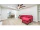 Stylish living room with ceiling fan and kitchen view at 6641 Pawnee Dr, Charlotte, NC 28214