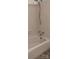 This bathroom offers a neutral tub and shower combination with updated hardware and accessories at 715 Gentry Pl, Charlotte, NC 28210