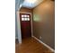 Inviting foyer features hardwood floors and a solid wood front door at 715 Gentry Pl, Charlotte, NC 28210