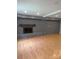 Cozy living room featuring a brick fireplace and hardwood floors at 715 Gentry Pl, Charlotte, NC 28210