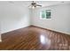 Spacious bedroom featuring hardwood floors, a bright window and a ceiling fan at 7308 Pleasant Hill Church Rd, Marshville, NC 28103