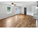 Bright living room showcasing beautiful hardwood floors, neutral paint, and natural light at 7308 Pleasant Hill Church Rd, Marshville, NC 28103