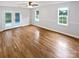 Inviting living room filled with natural light, featuring hardwood floors and access to the outdoors at 7308 Pleasant Hill Church Rd, Marshville, NC 28103