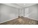Spacious bedroom with hardwood floors and plenty of closet space at 8514 Timber Crest Cir, Charlotte, NC 28226