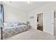 Comfortable bedroom with a daybed, neutral walls and an adjacent closet at 8840 Mullis Forest Ct, Mint Hill, NC 28227