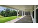 Covered patio overlooking a grassy yard and wooded area, perfect for outdoor living at 885 Regulus Ct # 42, York, SC 29745