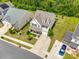 An aerial view of a two-story home with well-maintained landscaping and a private driveway at 922 Bunker Trce, Rock Hill, SC 29730