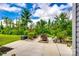 Picturesque backyard featuring a serene patio area and lush greenery creating a private oasis at 922 Bunker Trce, Rock Hill, SC 29730