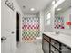 Bathroom with colorful shower curtain and white tile floors at 922 Bunker Trce, Rock Hill, SC 29730
