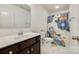 Well-lit bathroom featuring a vanity sink and a floral shower curtain adding a touch of color at 922 Bunker Trce, Rock Hill, SC 29730