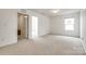 Spacious bedroom features carpet flooring and a window at 922 Bunker Trce, Rock Hill, SC 29730