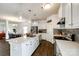 Bright kitchen features white cabinets, an island, and stainless steel appliances at 922 Bunker Trce, Rock Hill, SC 29730