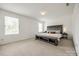 Main bedroom features a decorative headboard, neutral palette, and natural light at 922 Bunker Trce, Rock Hill, SC 29730