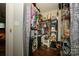 View of a walk in closet with shelving and clothing racks with wood flooring at 9239 N Vicksburg Park Ct, Charlotte, NC 28210