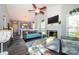 Bright living room featuring a fireplace, comfortable seating, and an open layout at 9239 N Vicksburg Park Ct, Charlotte, NC 28210
