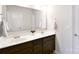 Bathroom featuring a double sink vanity, modern fixtures, and a large mirror at 104 Rockridge Point Dr, Mooresville, NC 28117
