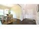 Bright dining area with hardwood floors, chandelier, and ample natural light from large windows at 104 Rockridge Point Dr, Mooresville, NC 28117