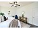 Cozy main bedroom with neutral decor, an area rug, and a ceiling fan at 104 Rockridge Point Dr, Mooresville, NC 28117