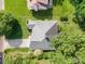 Aerial view of a single-story home with well-manicured landscaping, driveway, and established neighborhood surroundings at 105 Banksridge Rd, Fort Mill, SC 29715