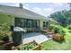 Backyard patio with outdoor seating, grill, and landscaped flower boxes at 105 Banksridge Rd, Fort Mill, SC 29715