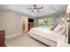 Spacious primary bedroom with neutral walls, large window and en-suite bathroom at 105 Banksridge Rd, Fort Mill, SC 29715