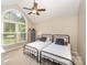 Shared bedroom with vaulted ceiling, ample natural light, and two beds at 105 Banksridge Rd, Fort Mill, SC 29715