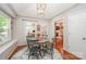 Bright breakfast nook with a round table, four chairs, and lots of natural light at 105 Banksridge Rd, Fort Mill, SC 29715