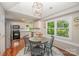 Bright breakfast nook with a round table, four chairs, and lots of natural light at 105 Banksridge Rd, Fort Mill, SC 29715