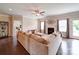 Spacious living room with a cozy fireplace and view to backyard at 114 Sierra Chase Dr, Statesville, NC 28677