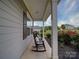 Inviting porch with rocking chairs and decorative pillows at 114 Sierra Chase Dr, Statesville, NC 28677