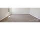 Cozy bedroom featuring neutral carpet, ample natural light, and freshly painted walls at 116 Obadiah Ct, Mooresville, NC 28115