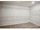 Walk-in closet featuring ample shelving, providing plenty of storage space at 116 Obadiah Ct, Mooresville, NC 28115