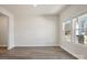 Bright living area featuring hardwood floors, lots of natural light, and freshly painted walls at 116 Obadiah Ct, Mooresville, NC 28115
