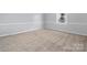 Cozy bedroom with neutral walls and plush carpet at 12491 Oak Grove Rd, Stanley, NC 28163