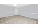 Bedroom featuring neutral walls, carpet and white trim at 12491 Oak Grove Rd, Stanley, NC 28163