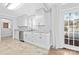 Bright kitchen with stainless steel appliances and view to backyard at 12491 Oak Grove Rd, Stanley, NC 28163