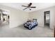 Spacious bedroom with a comfortable bed, closet access, and ample natural light at 13107 Heath Grove Dr, Huntersville, NC 28078