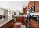 Spacious kitchen featuring a central island, stainless steel appliances, and seamless access to the living area at 13107 Heath Grove Dr, Huntersville, NC 28078