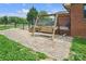 Charming backyard with patio and swing, great for relaxing and enjoying the outdoors at 1609 Troy Rd, Shelby, NC 28150