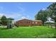 Large backyard with play structure offering room for recreation and outdoor activities at 1609 Troy Rd, Shelby, NC 28150